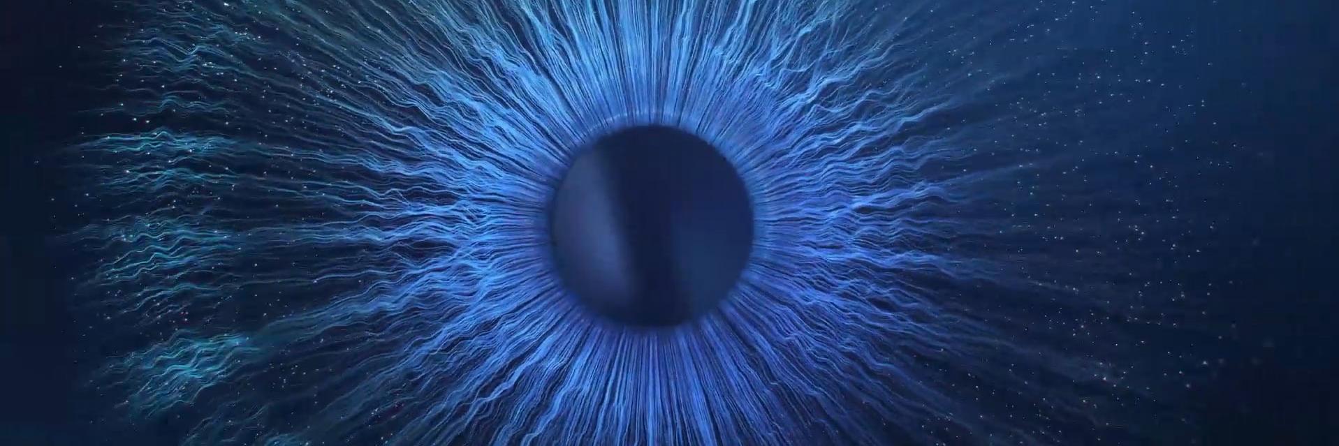 Animação para Desafie os Limites da Imaginação - close-up de um globo ocular azul no escuro.