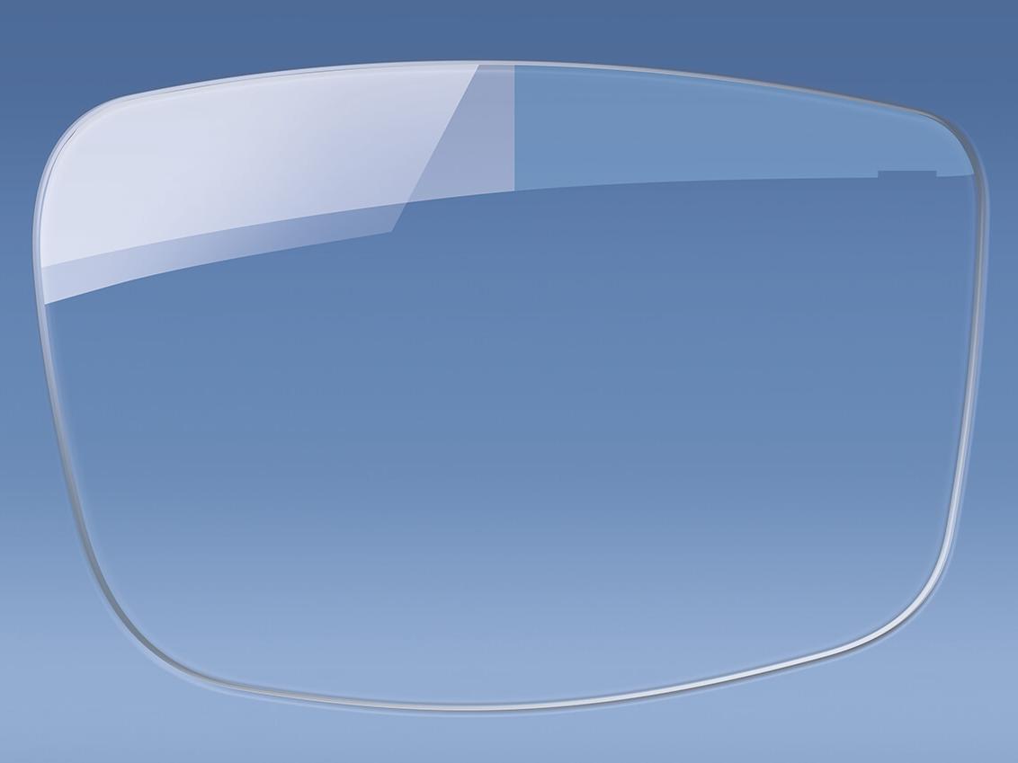 Imagem de uma lente de óculos com e sem revestimento antirreflexo 