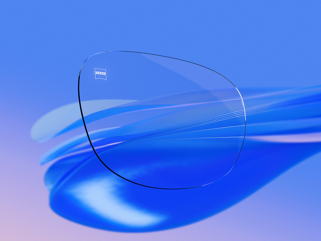 Ilustração CGI em 3D de uma lente de óculos transparente com reflexos mínimos, ressaltando sua nitidez excepcional e sua qualidade óptica.