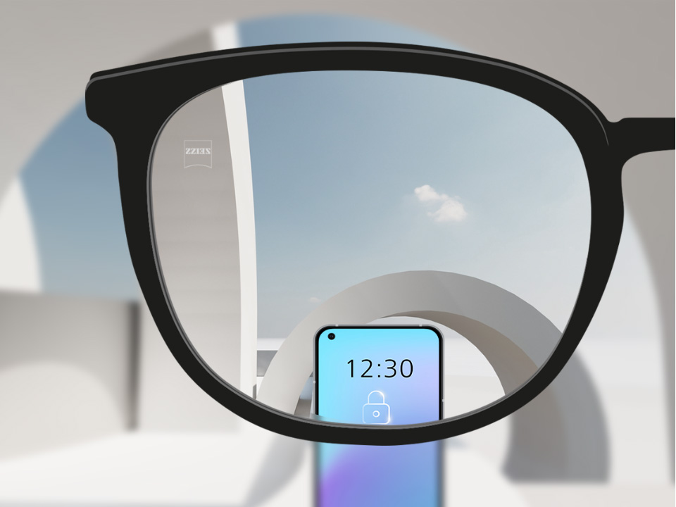 Ilustração esquemática da visão através de uma lente de visão simples ZEISS SmartLife Young mostrando uma visão nítida de objetos distantes e dispositivos digitais. 