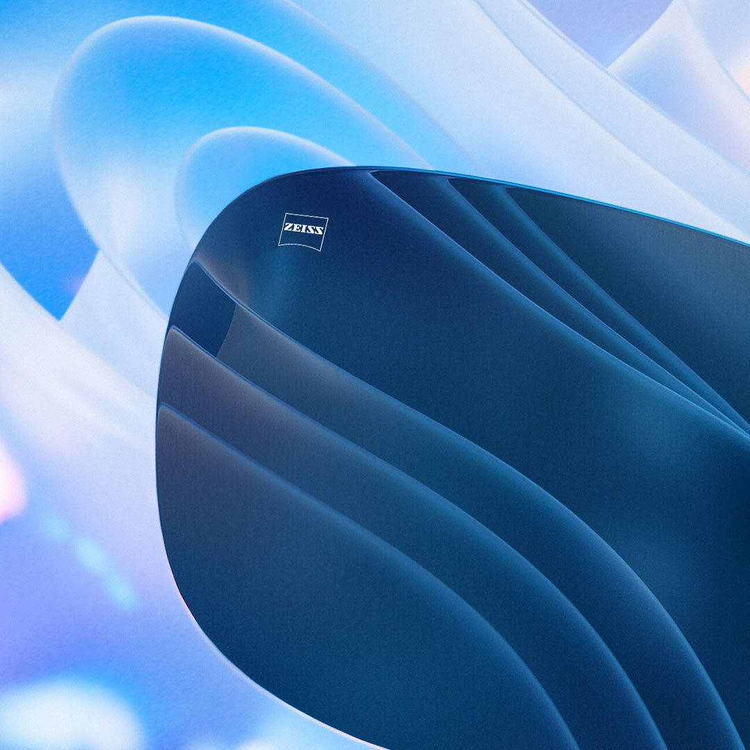 Uma representação em CGI de uma lente colorida é mostrada bloqueando de forma eficaz o brilho visível no fundo